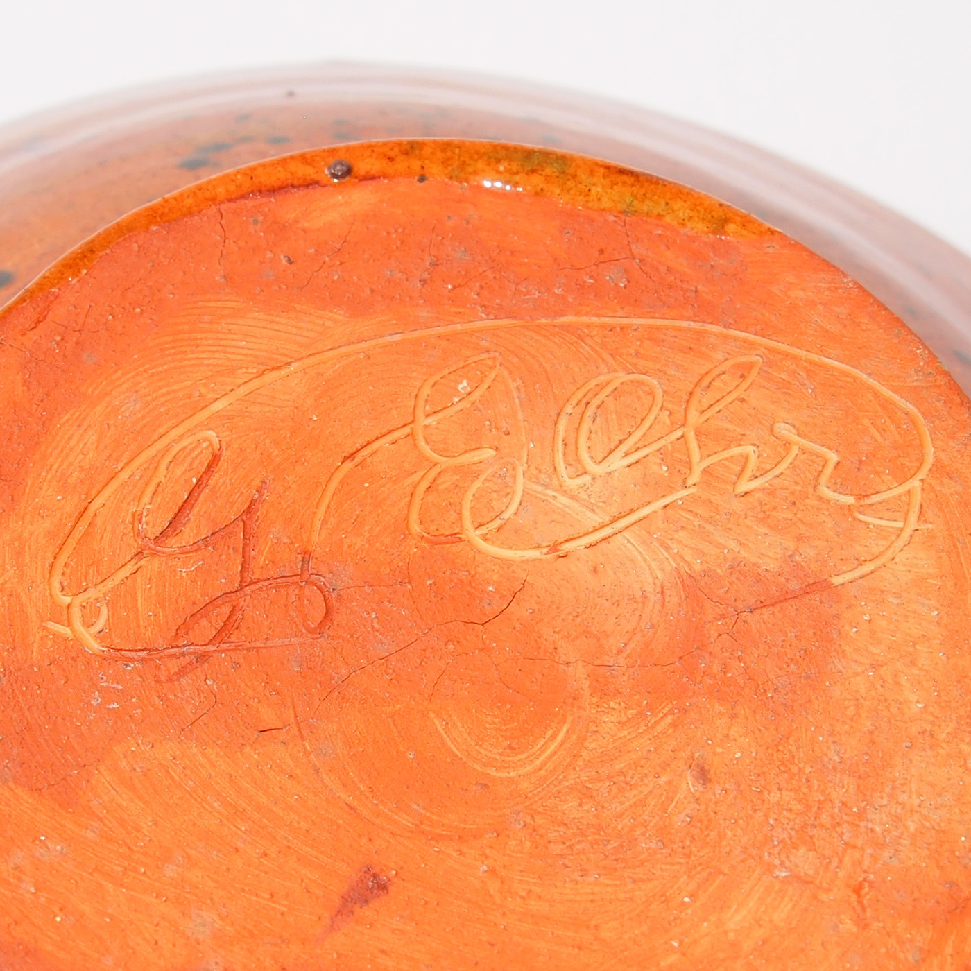Firma de George E. Ohr: G E Ohr.