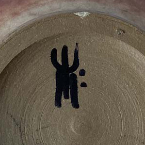 Firma di ceramica di Mario Enke: E sopra M.