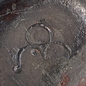 One of several ceramic marks by Otto Meier: om (o on m)